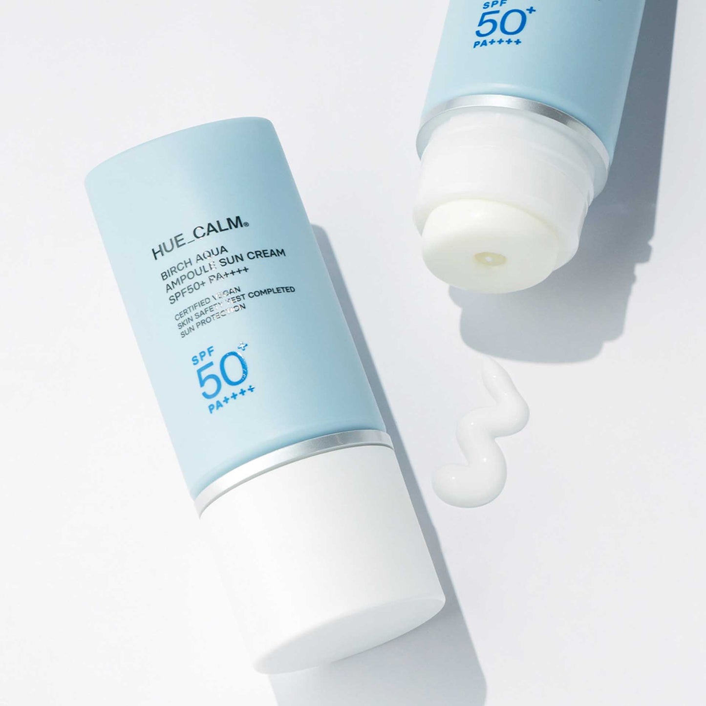 Opened tube of Huecalm Sun Cream showing texture