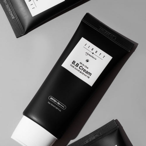 Close-up of Jigott All-in-One BB Cream black tube at an angle
