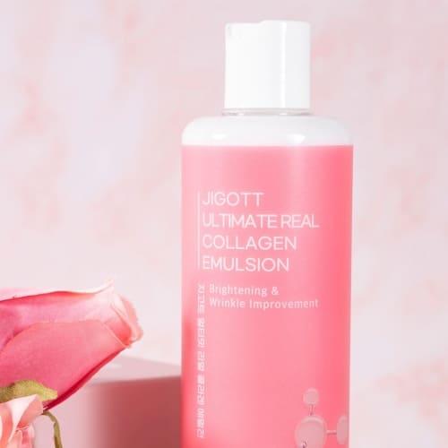 Product bottle styled with rose and pink marble texture backdrop