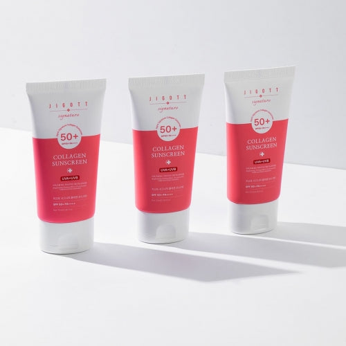 Three Jigott Collagen Sunscreen tubes upright on white background for wholesale display