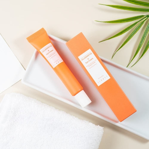 Jigott Collagen Eye Cream tube and packaging laid out neatly on a white tray