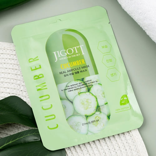 Close-up of single mask on towel with leaf accent for spa feel