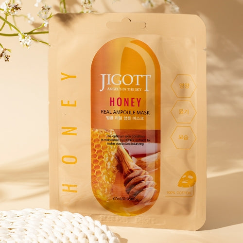 Single JIGOTT Honey Mask standing upright with soft sunlight and minimal decor