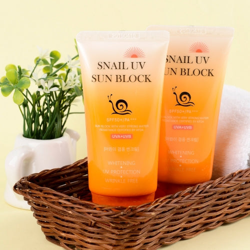 Jigott Snail UV Sunscreen twin pack in basket with plant props for skincare display