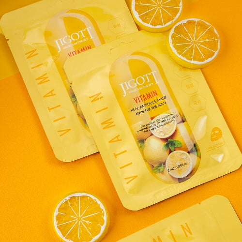 Citrusy flatlay of vitamin masks with vibrant orange tones and lemon accents