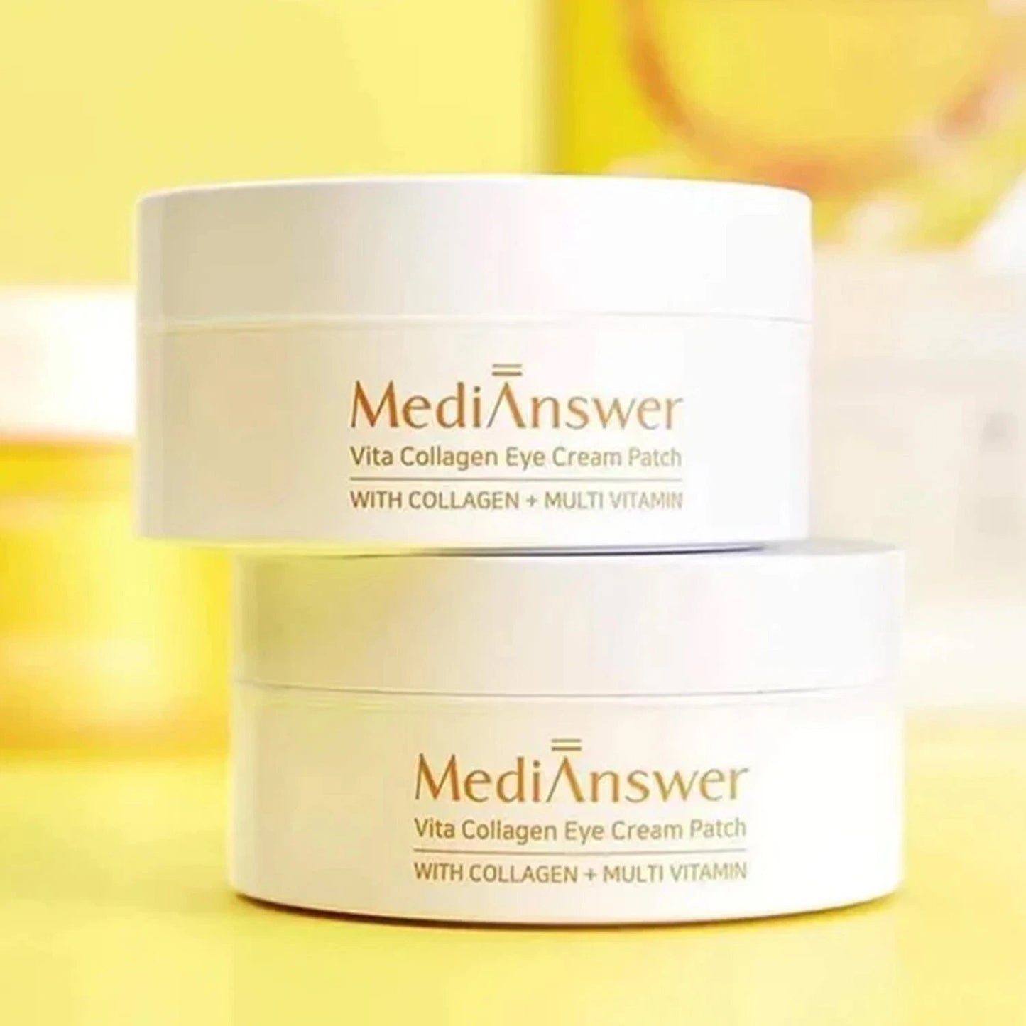 Two stacked MediAnswer Vita Collagen Eye Cream Patch jars displayed on a yellow background