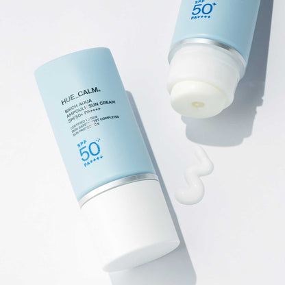 Opened tube of Huecalm Sun Cream showing texture