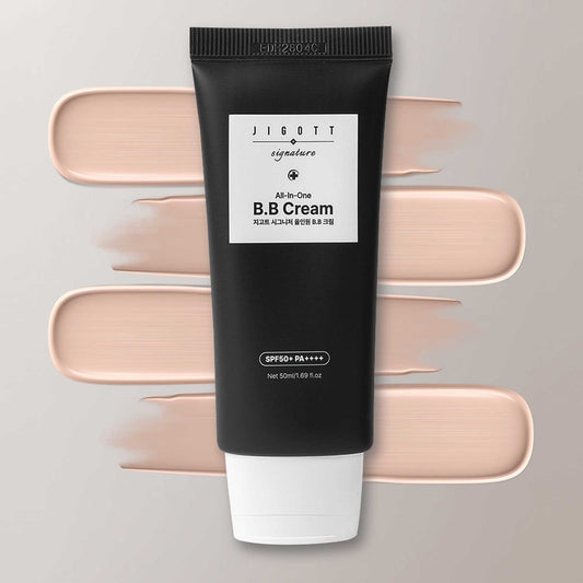 Jigott All-in-One BB Cream with beige tone swatches spread behind the tube