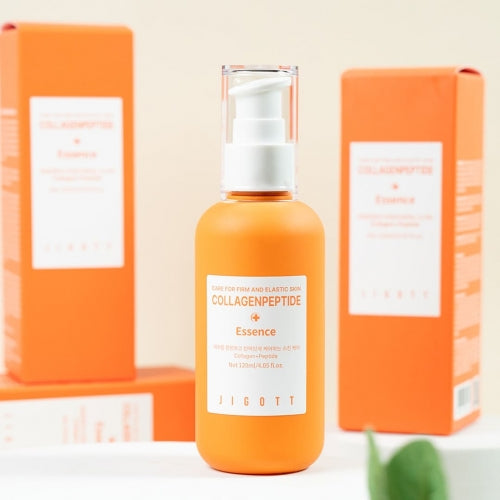 Jigott Collagen Peptide Essence in front of stacked product boxes for wholesale display