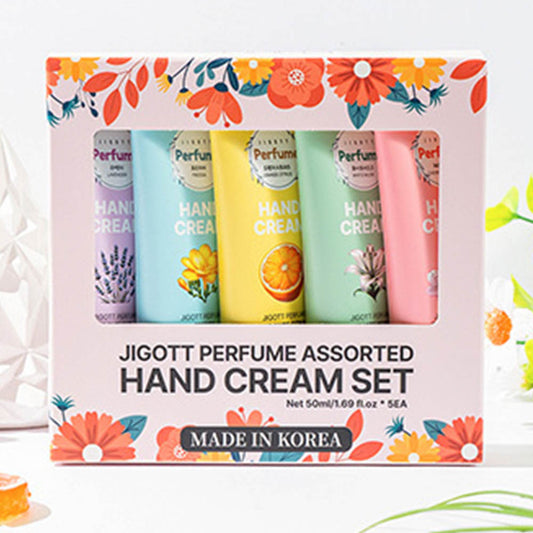 Boxed set of 5 JIGOTT Perfume Hand Creams displayed with floral decoration